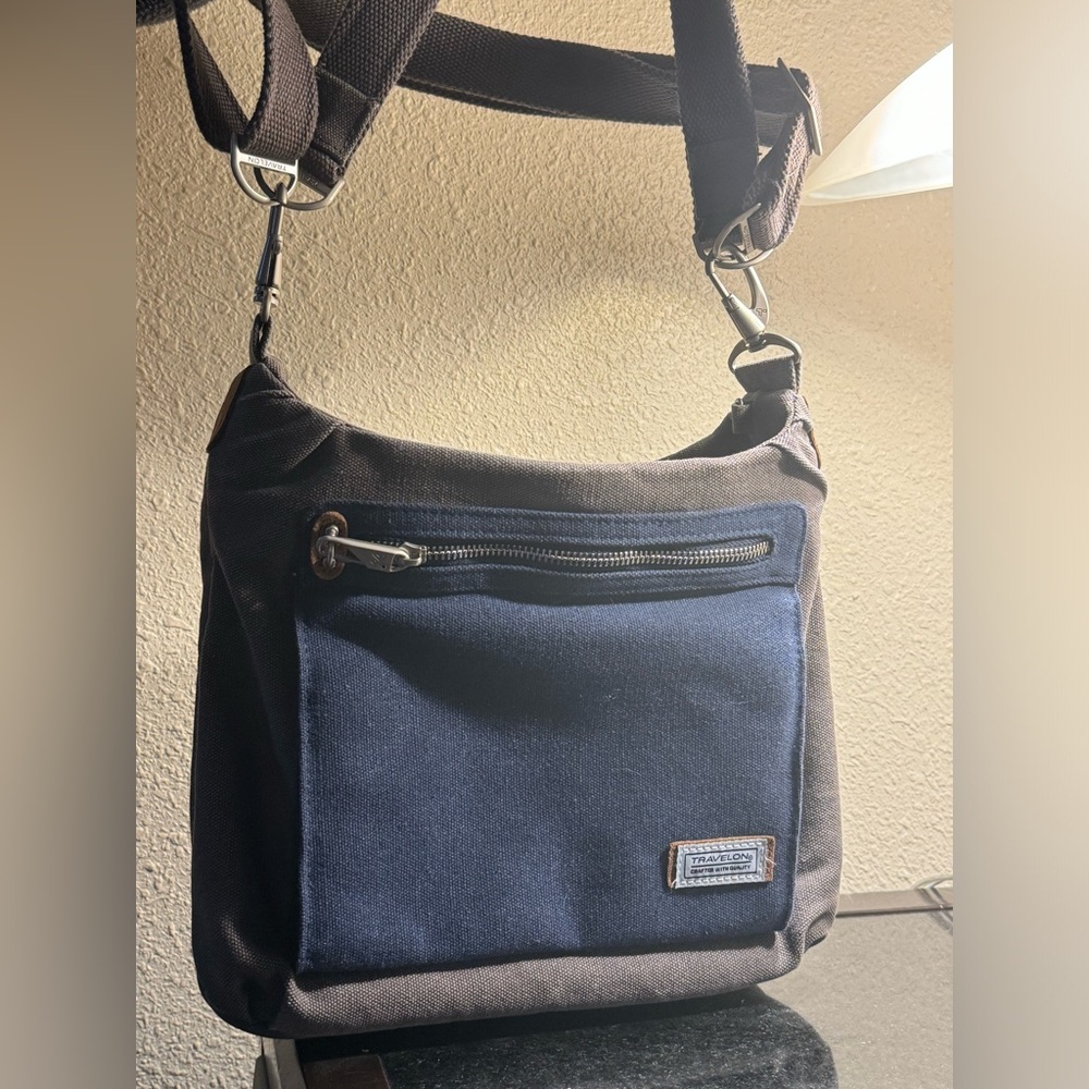 Travelon heritage grey canvas, antitheft, RFID shoulder/crossbody bag w/ pocket